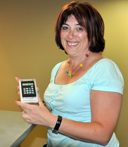 Contest Grand Prize winner Larisa Roiberg shows off her new iPod touch.