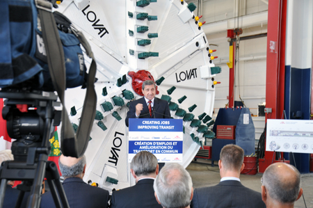 York Regional Chairman Bill Fisch speaks to the audience and TV cameras in front of an actual tunnel boring machine last Friday.