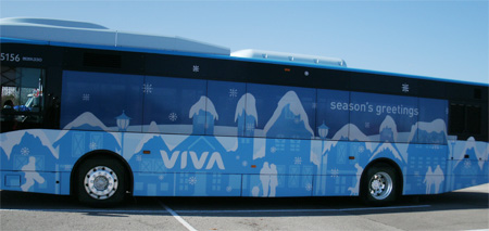 Look for people walking near this bus to donate mittens, gloves and hats for those in need.