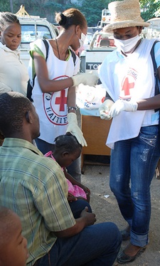 Aid workers provide medical attention in Haiti. Photo courtesy of IFRC/Eric Quintero.