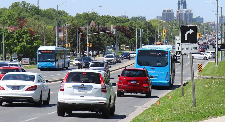 buses and cars in heavy traffic