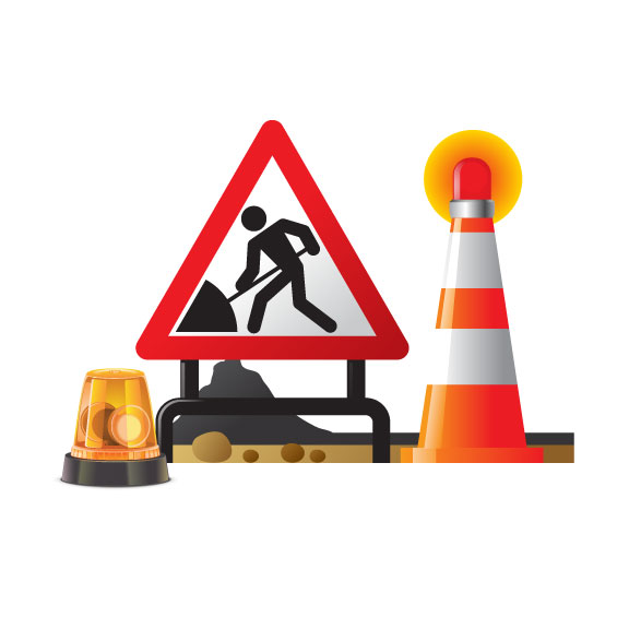 workers digging sign with construction cone